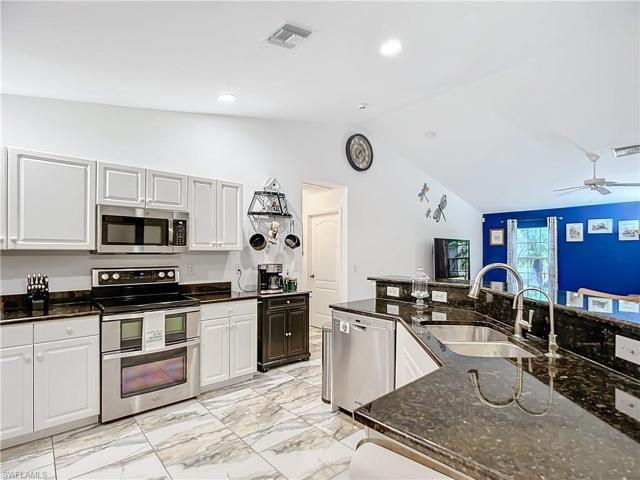 1052  Summa  BLVD, Lehigh Acres, FL 33974