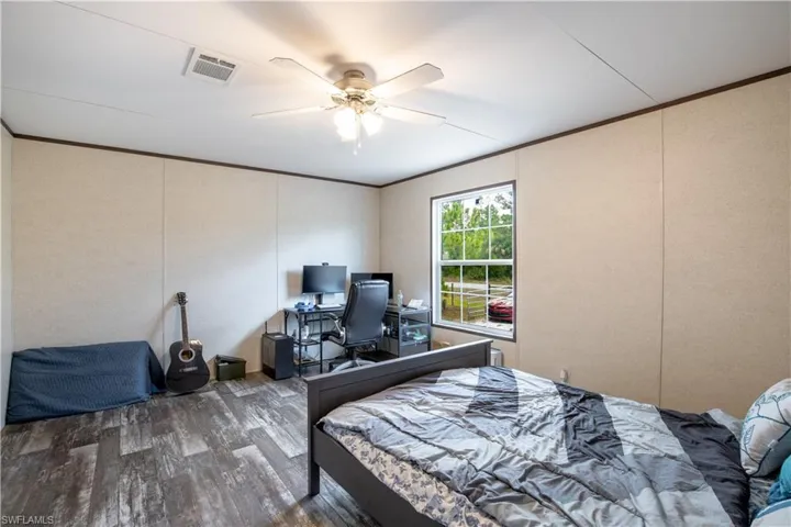 Bedroom featuring ceiling fan