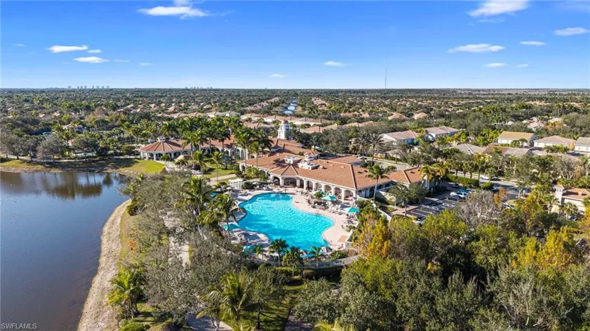 Aerial perspective of suburban area with a pool area