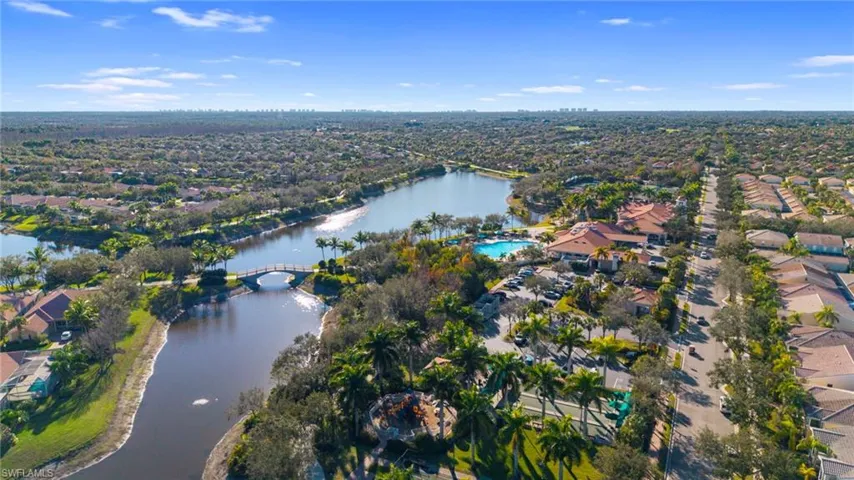 Aerial overview of property's location featuring nearby suburban area and a large body of water