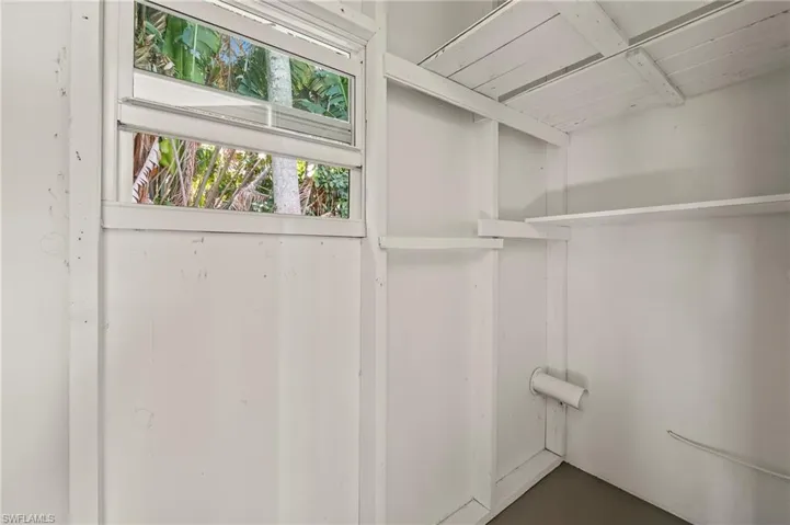 Laundry room at back of carport