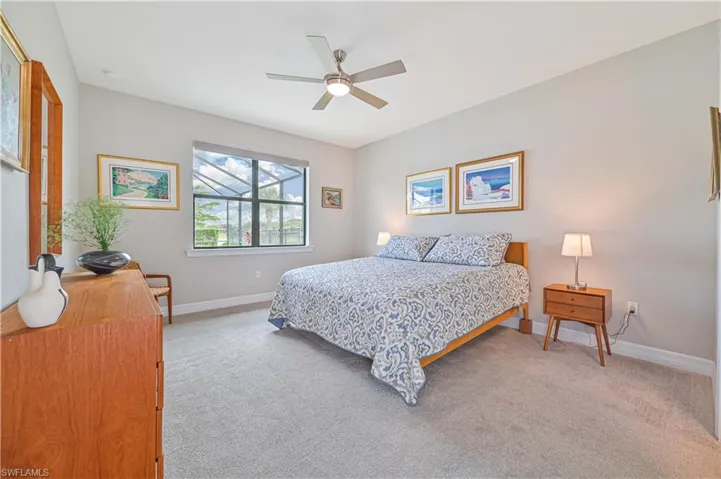 Bedroom with carpet flooring and ceiling fan