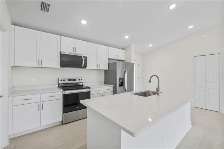 1927 NW 22nd  PL, Cape Coral, FL 33993
