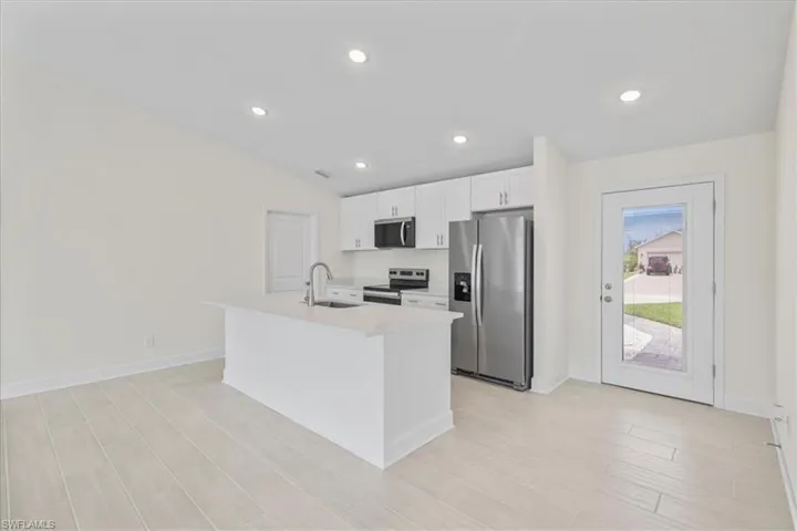 1927 NW 22nd  PL, Cape Coral, FL 33993