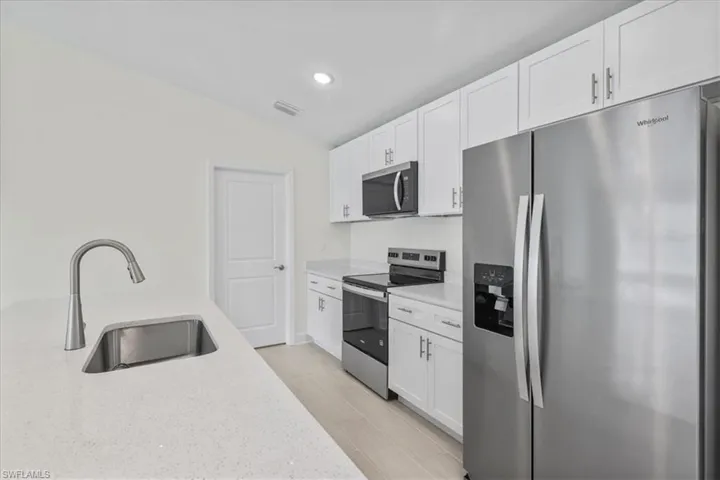 1927 NW 22nd  PL, Cape Coral, FL 33993