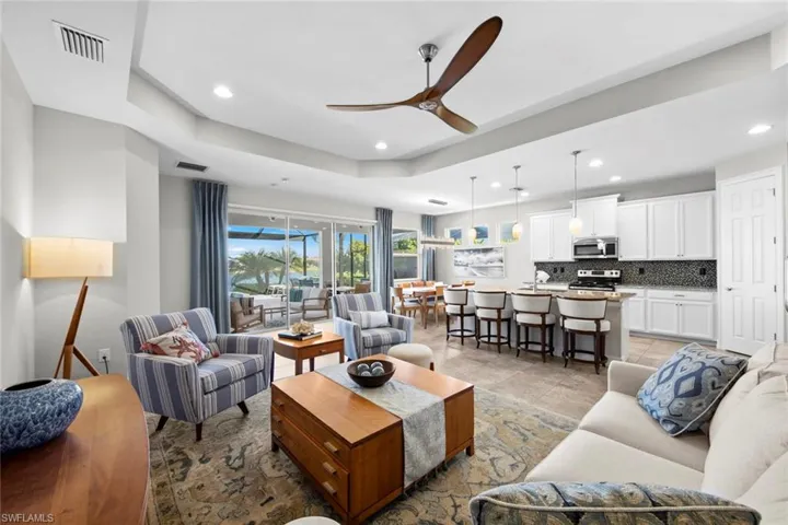 Open floor plan with plenty of space for entertaining. The home has been extremely well maintained. New ceiling fan (July 2022).
