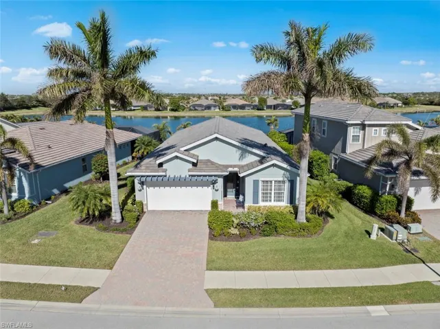 WELCOME HOME! 4 bedrooms + den, 3 full baths and half POOL BATH. 2438 livable square feet and 3149 total square feet in this OPEN FLOOR PLAN home on a WATERFRONT LOT with irrigation system. The concrete block home has a 2-car garage with ELECTRIC CAR CHARGER (April 2024), Mini-split AC (December 2020) and Arlo CAMERA SECURITY SYSTEM (April 2017)