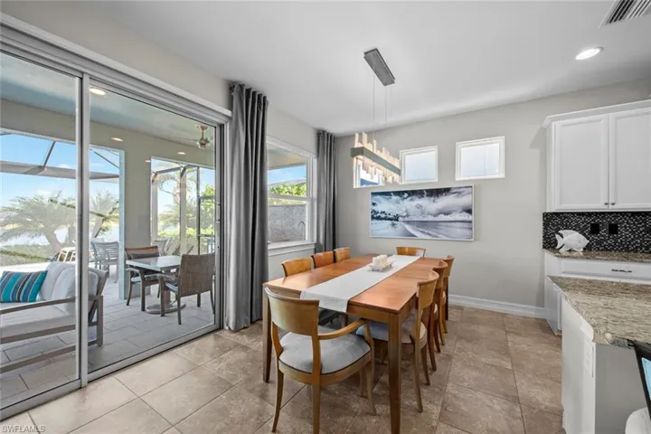 AUTOMATED WINDOW BLINDS with remote (August 2017) are located on the large dining room window.