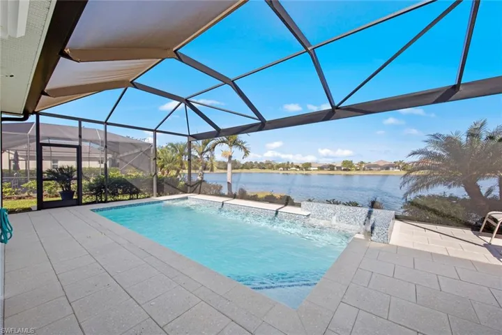 CUSTOM POOL with wide water views.