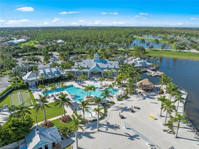 Naples Reserve is a manned gated community. The Island Club offers a cafe, meeting spaces, resort style pool, lap swimming lanes, bocce ball court and private beach on the 125 acre Big Eagle Lake with private beach offering volleyball and sunbathing. The low HOA fees include all the clubhouse amenities, lawn care and irrigation for each home.