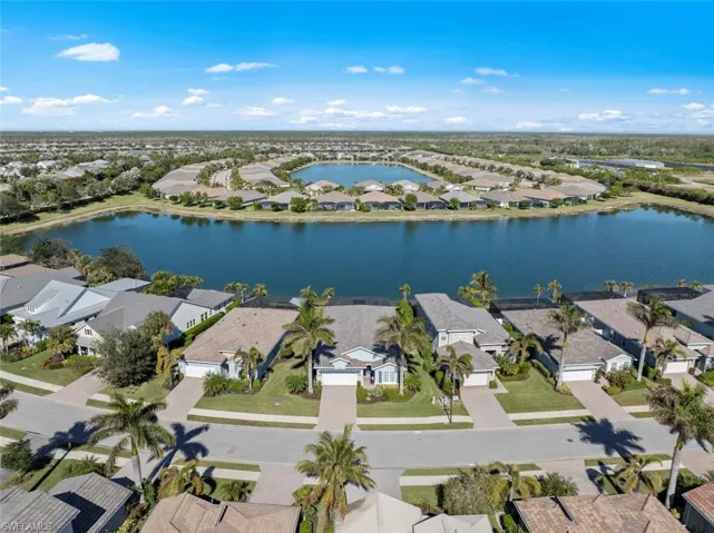 The home sits on a large lake with wide water views.