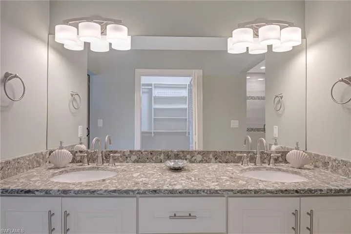Full bath with double vanity &  spacious closet