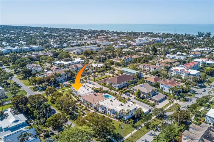 Aerial view of property's location featuring nearby Cambier Park, beach access, 5th Ave, 3rd Ave...