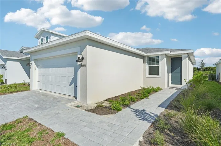 View of front of home featuring a garage
