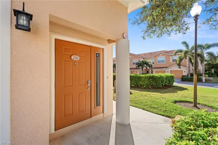 Property entrance with a yard