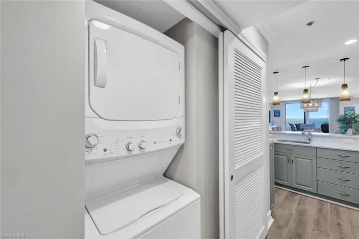 Washroom with stacked washer / dryer