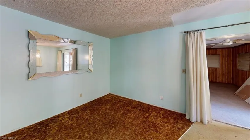 dining room with a textured ceiling