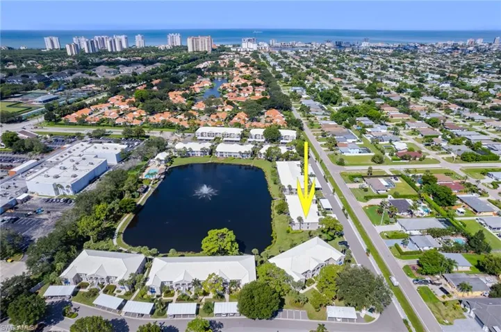 Aerial overview of property's location with Gulf of America and shopping nearby