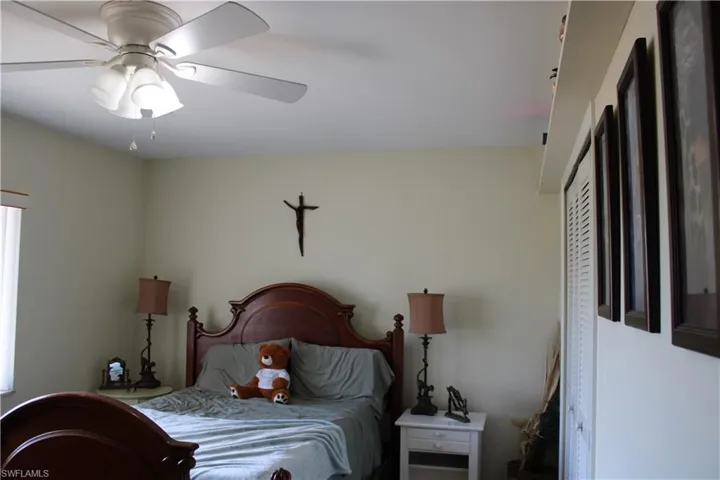 Bedroom featuring a ceiling fan