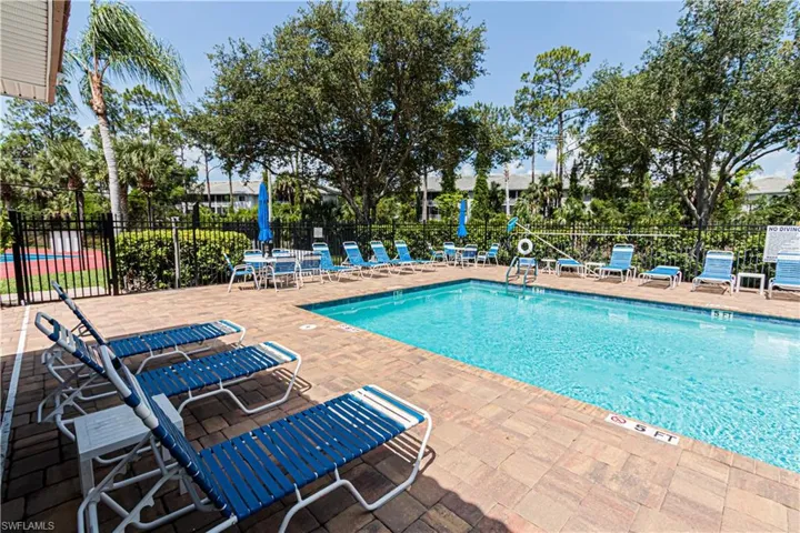 Community pool featuring a patio area