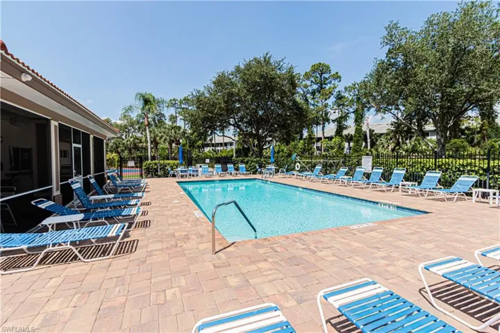 Community pool with a patio area
