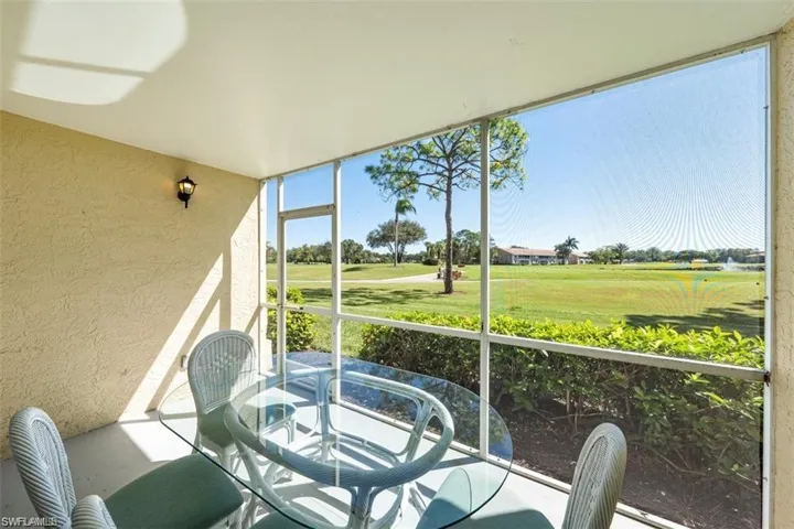 Sunroom / solarium with view of golf course