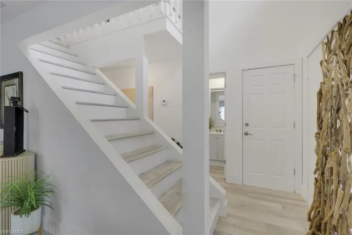 Staircase with wood finished floors