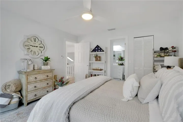Bedroom on 2nd floor featuring ceiling fan and a closet