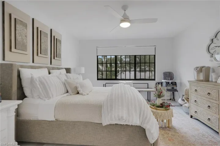 Bedroom on 2nd floor featuring a ceiling fan