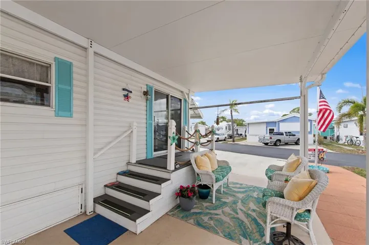 Covered porch with a residential view