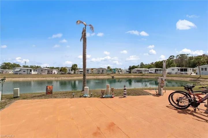 Water view with nearby suburban area