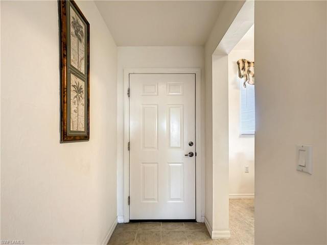Interior entry. Kitchen to the side.