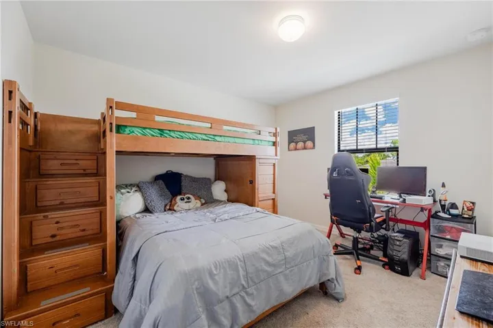 Bedroom featuring carpet floors