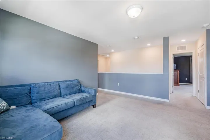 Living room featuring carpet