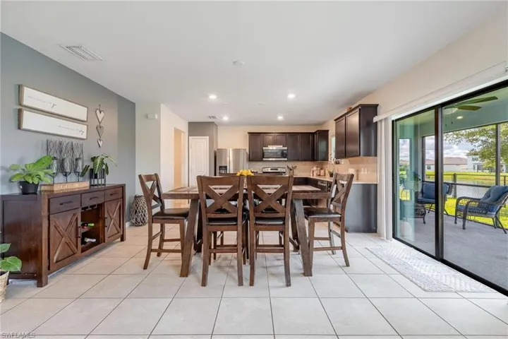 Dining room with light tile floors