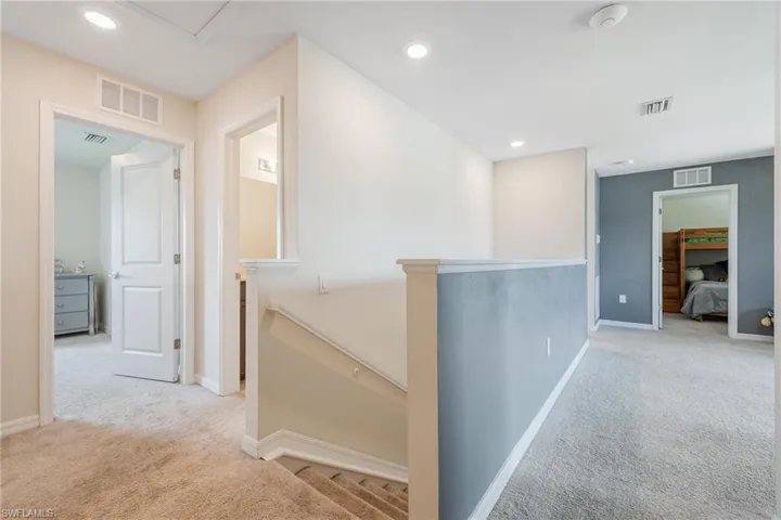 Hall with light carpet