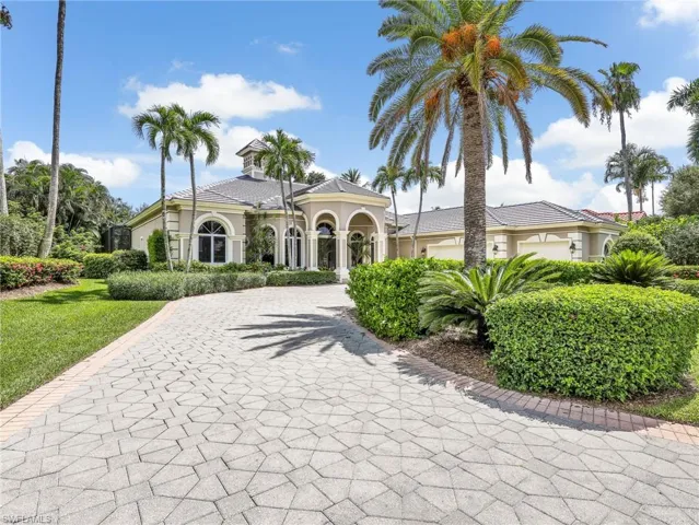 Circular drive with three car garage