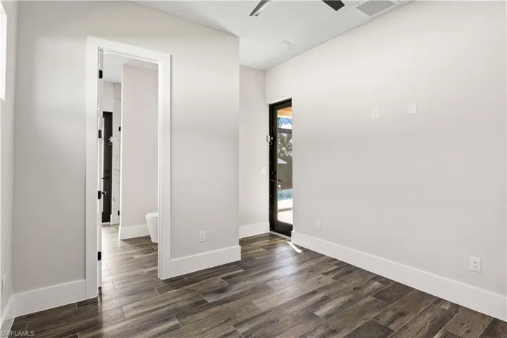Office that could be a fifth bedroom or den - this has its own bathroom with access to the outside from both the bathroom and the office itself!