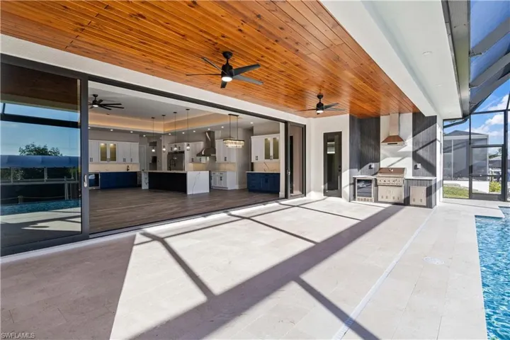 The best part of living in Florida is the water and the outdoor area that we get to enjoy mostly year round!  This home was designed to blend the indoor and outdoors together to maximize the living space!  Cook inside or cook outside - either way you win!