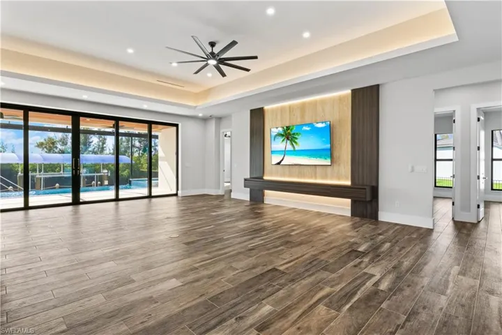 The great room is very spacious and oversized - with disappearing sliders that blend and extend the indoor and outdoor living space!