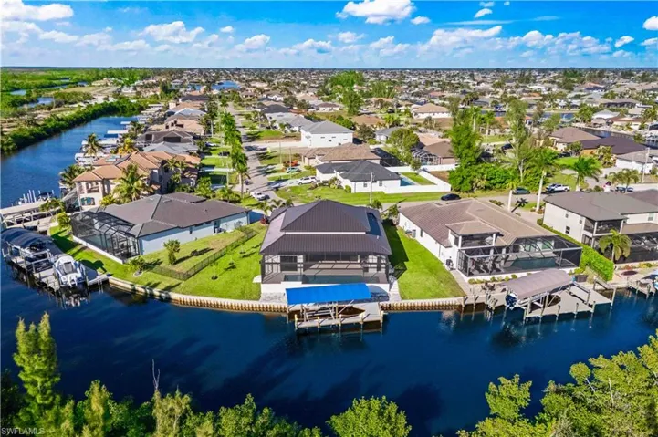 LOCATION LOCATION LOCATION!  Situated in the heart of the booming Burnt Store area and surrounded by beautiful homes, this SOUTH facing premium lot is nestled on a corner with easy access to the 7 Island Project, less than a three minute walk to Sirenia Vista Park - an 8 acre environmental park with walking trails, a haven for manatees and a kayak launch to the Great Blue Calusa.  Just a five minute walk to Joe Stonis Park for pickleball, bbqs and activities!  So much to do withing walking distance!