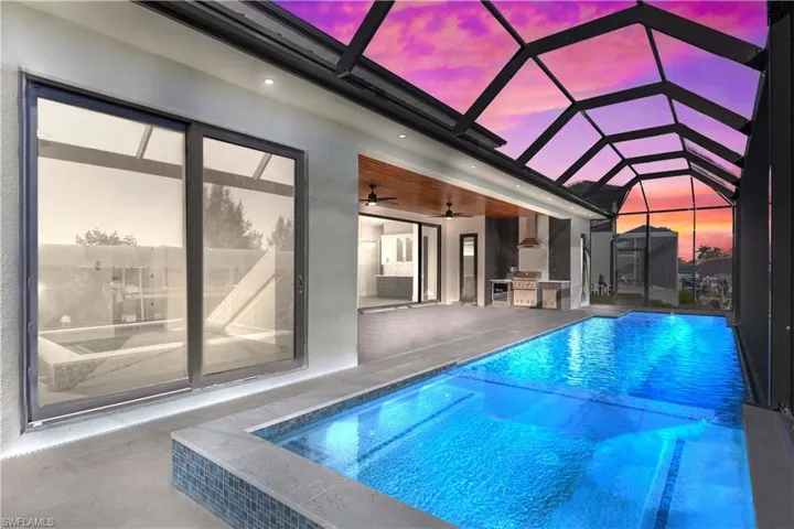 Gorgeous heated pool and spa with extensive outdoor living space.  Built in outdoor kitchen with cypress ceiling, this home is a ten out of ten!