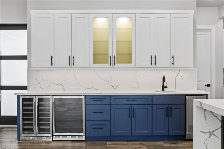 Wetbar entertainment area!  If you like to entertain, this is a dream!  In addition to the expansive kitchen and butler's pantry, this buffet offers a built in beverage center, wine fridge and built in icemaker...let the parties and events begin!
