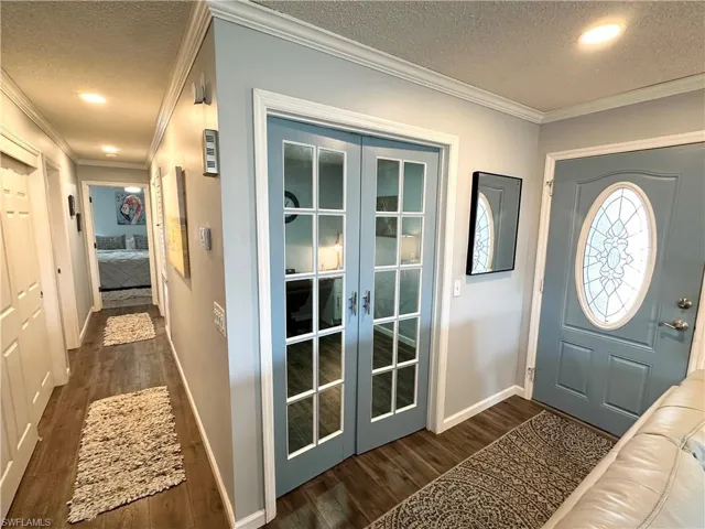 French doors to office and front door to the home.