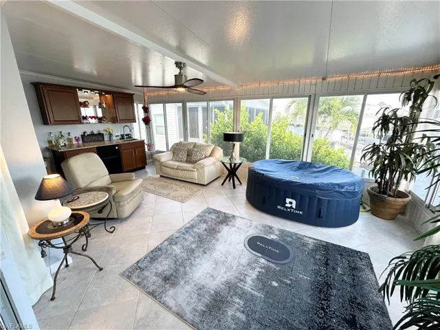 Florida room.  Notice the Jacuzzi?