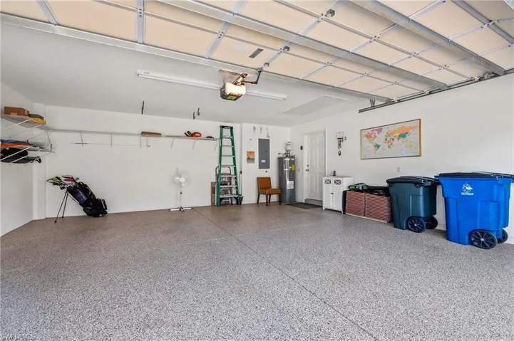 15437 Puffin Drive Bonita Springs FL 34135 - Garage with epoxy finished floor.