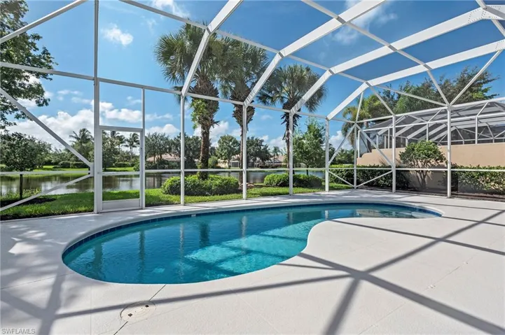 15437 Puffin Drive Bonita Springs FL 34135 - Pool cage with 2 screen door entrances and reinforced corners.