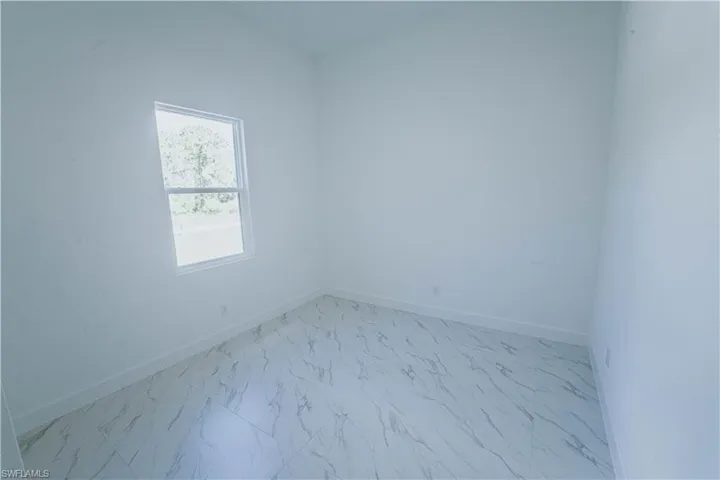 View of tiled empty room