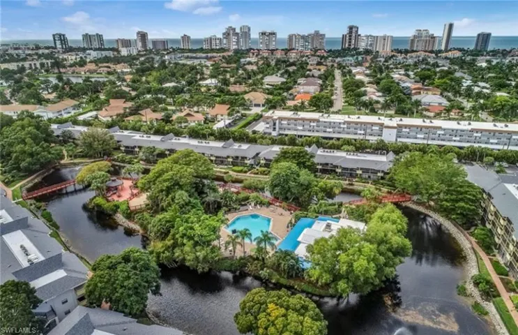 Bird's eye view of a large body of water and skyline
