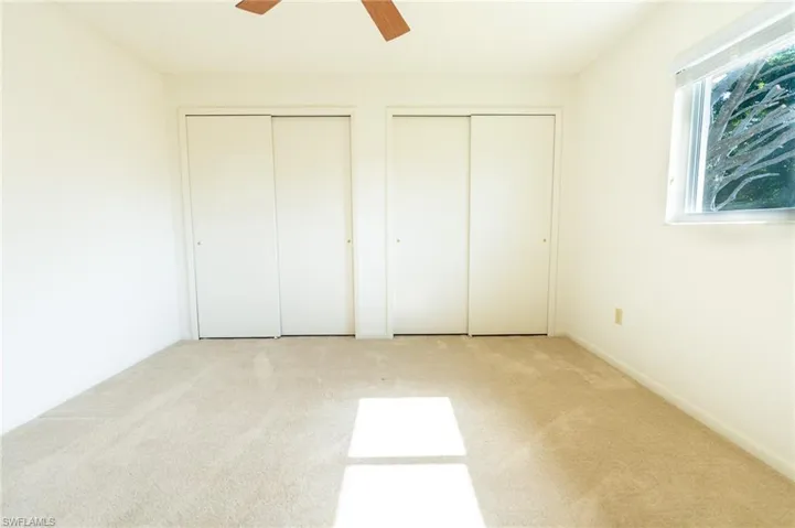 Primary Bathroom featuring a tile shower